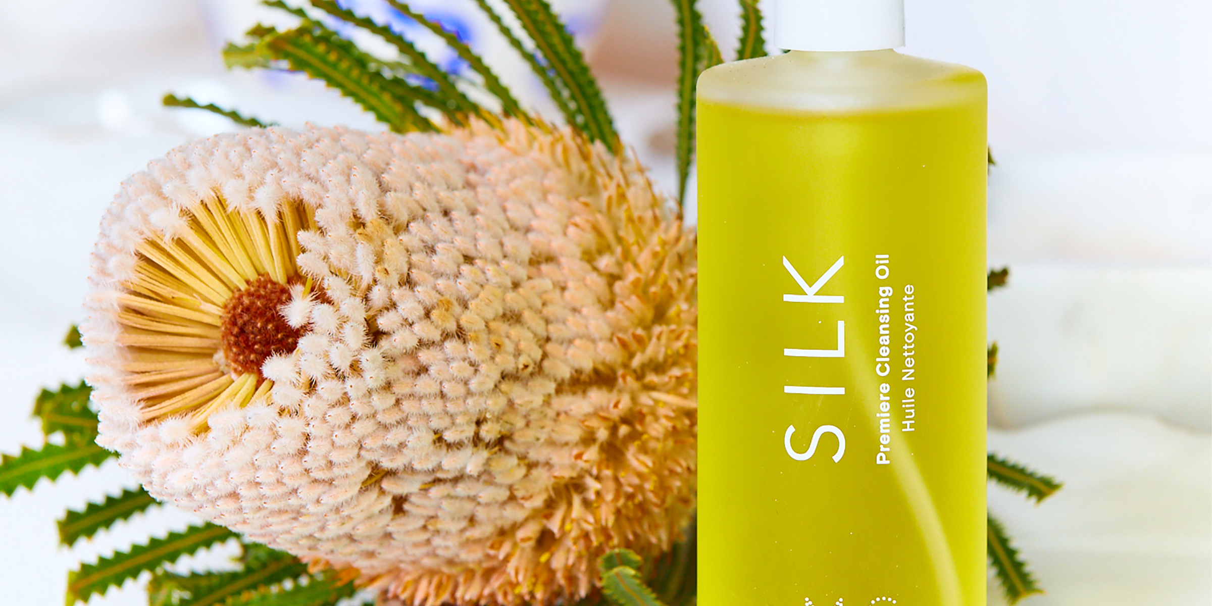 Silk Oil Cleanser in frosted glass bottle