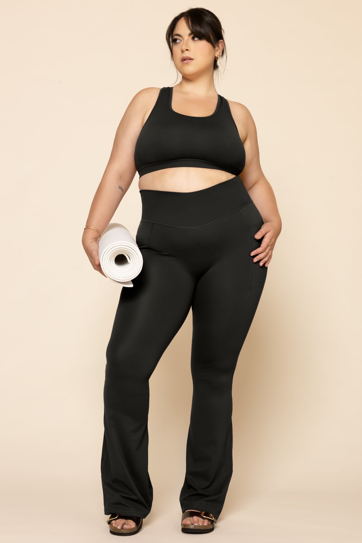 Leggings acampanados con bolsillos Supersculpt™ - Negro