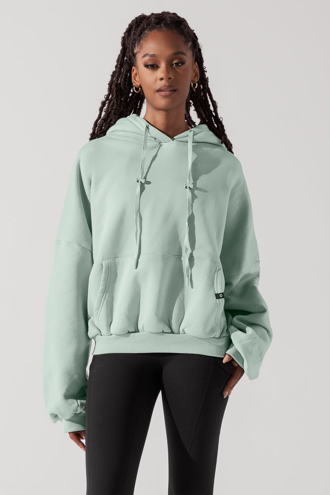 Sudadera con capucha y diseño de nubes en color menta